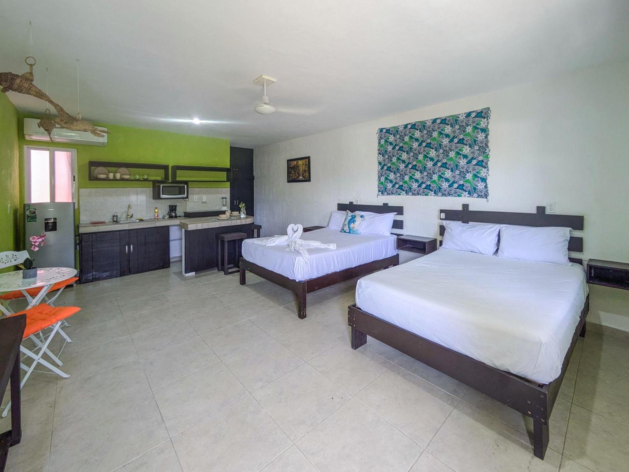 A8 Beachside Bliss Family Hawaiian Themed Quad Kitchen Ac
